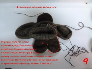 Monkey made from socks and yarn 11