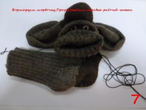 Monkey made from socks and yarn 9