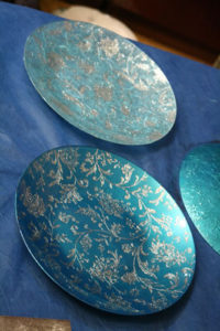 plates with a brocade effect 22