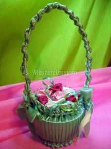 Basket with flowers ribbons and plastic boxes 11