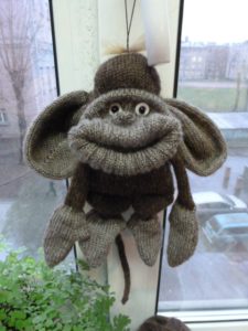 Monkey made from socks and yarn 16